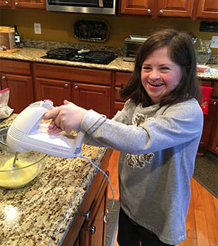 COSA Member Girl Cooking, The Arc of North Central Virginia